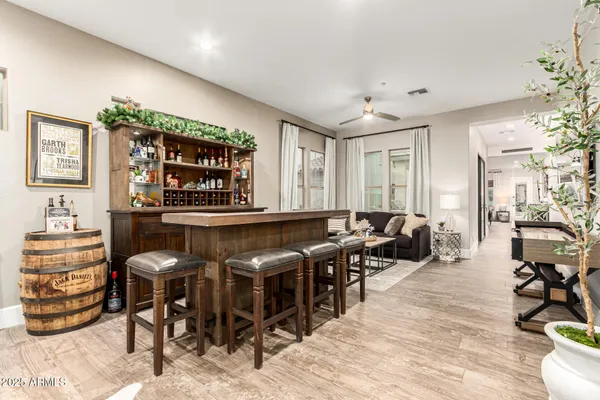 a kitchen with stainless steel appliances granite countertop a stove a microwave and cabinets