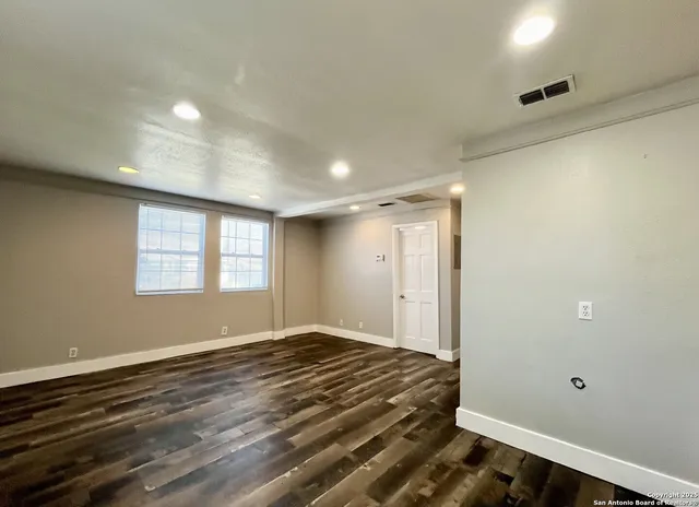 a view of a closet area with closet