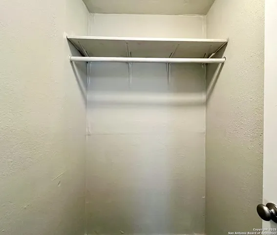 a bathroom with a shower and a shower