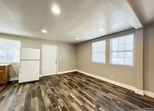 a view of a kitchen with a sink