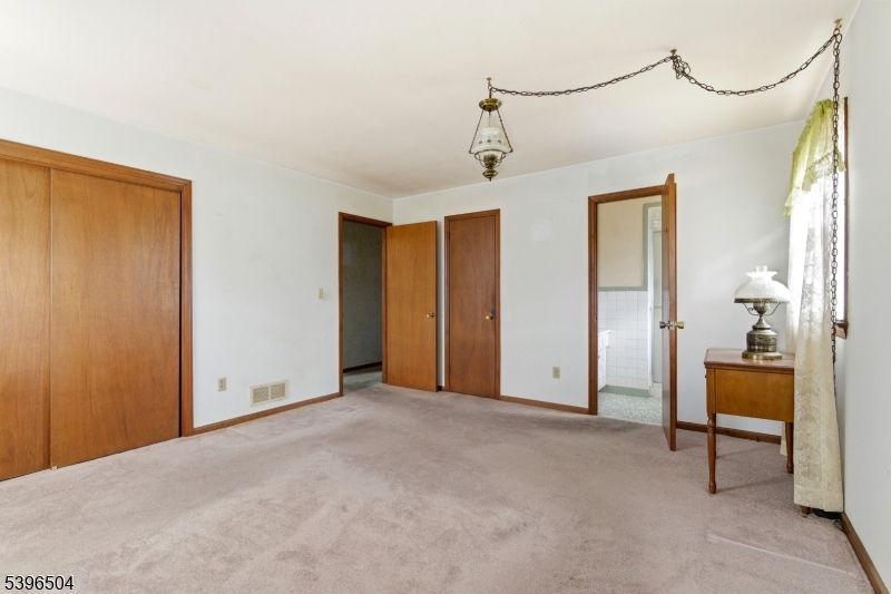 10 Red Oak Way Bridgewater, NJ 08807 - Photo 12 of 30 a view of an empty room with a window