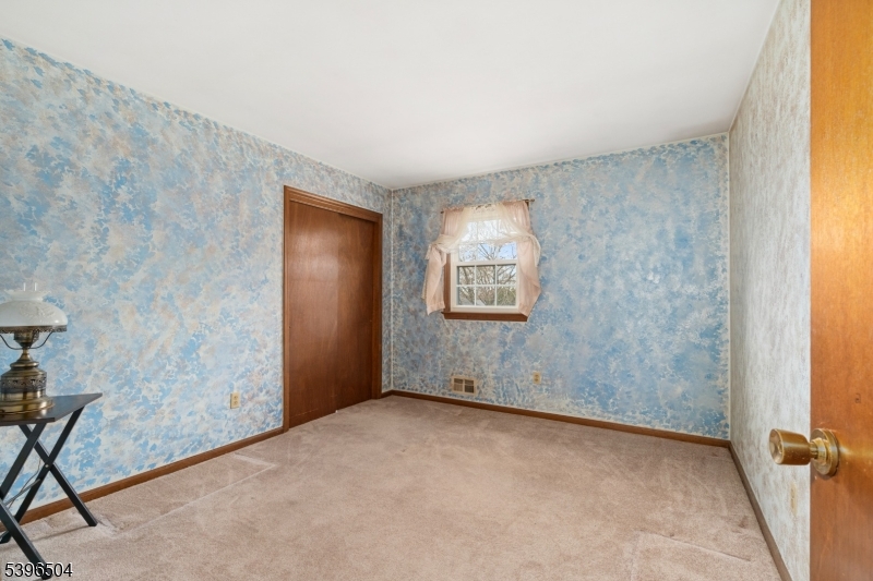 10 Red Oak Way Bridgewater, NJ 08807 - Photo 14 of 30 a view of an empty room with a window