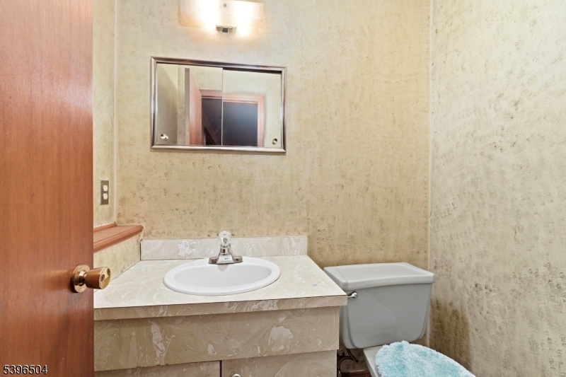 10 Red Oak Way Bridgewater, NJ 08807 - Photo 24 of 30 a bathroom with a sink and a toilet