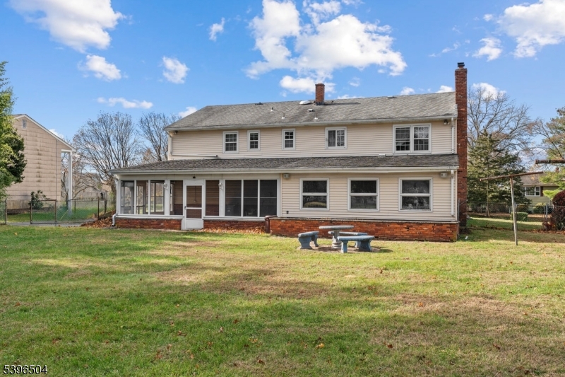 10 Red Oak Way Bridgewater, NJ 08807 - Photo 26 of 30 a front view of a house with a yard