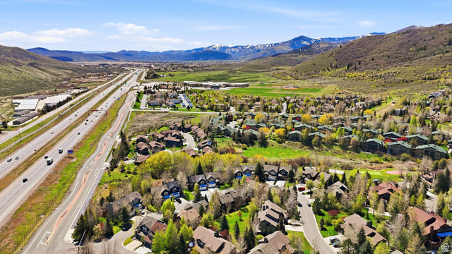 7935 Mustang Loop Road Park City, UT 84098 - Photo 58 of 60 Expansive aerial showing a residential community nestled within a mountainous landscape