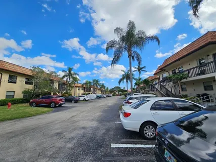 a car parked in front of a house