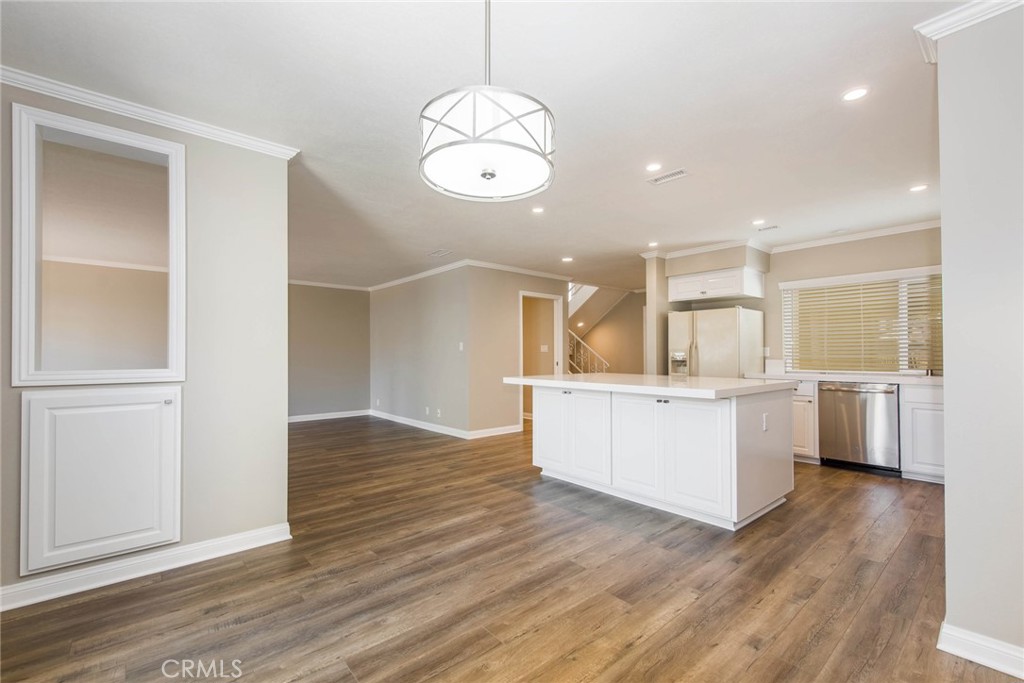 a view of kitchen with wooden floor