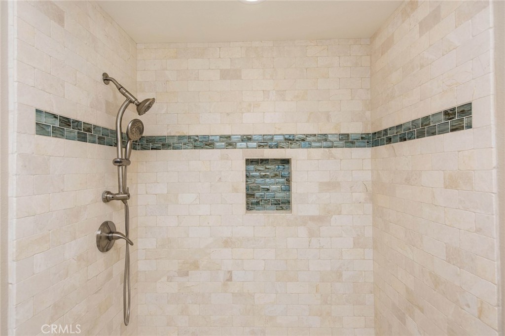 20 Acacia Tree Lane Irvine, CA 92612 - Photo 12 of 44 a bathroom with a shower