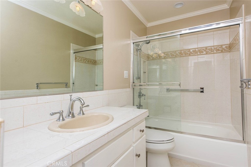 20 Acacia Tree Lane Irvine, CA 92612 - Photo 18 of 44 a bathroom with a sink toilet and shower