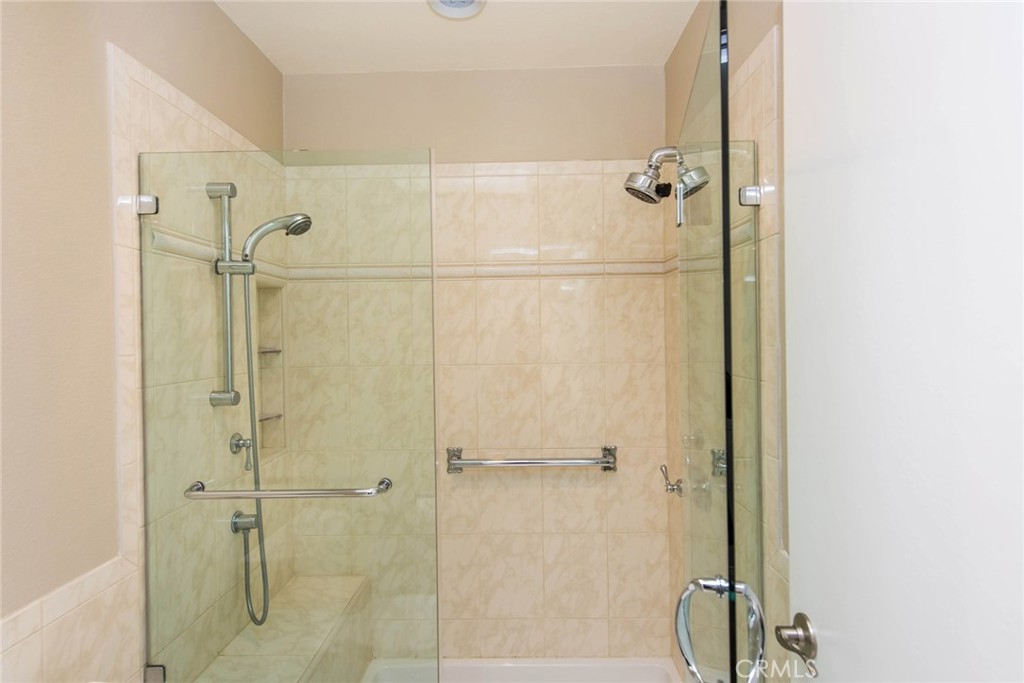 20 Acacia Tree Lane Irvine, CA 92612 - Photo 24 of 44 a bathroom with a shower