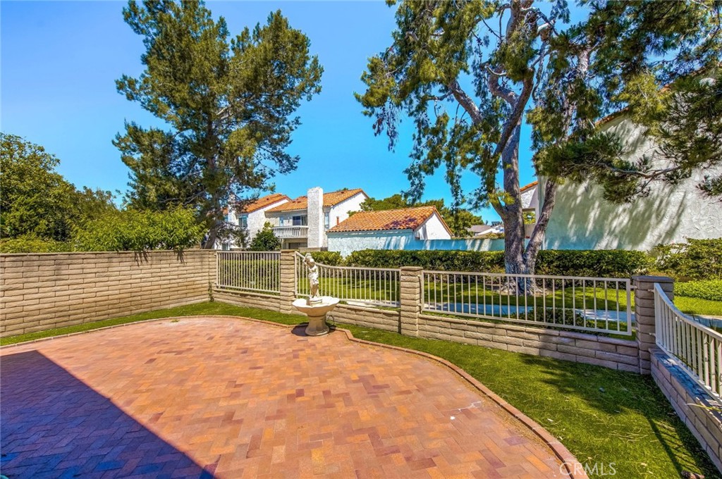 20 Acacia Tree Lane Irvine, CA 92612 - Photo 25 of 44 a view of a swimming pool with a patio and a yard