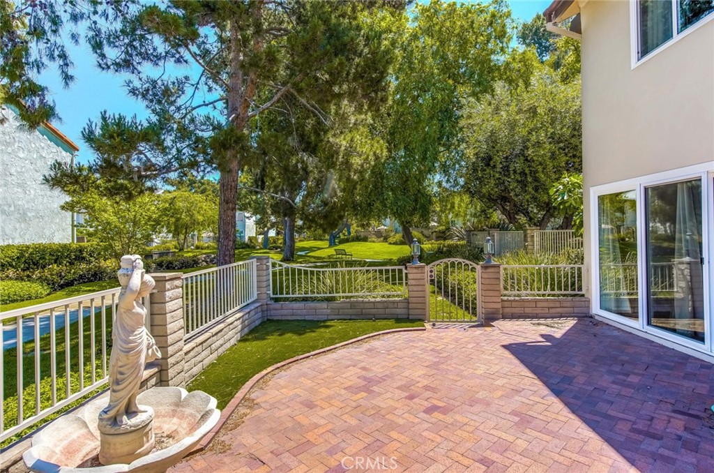 20 Acacia Tree Lane Irvine, CA 92612 - Photo 27 of 44 a view of a deck with a backyard