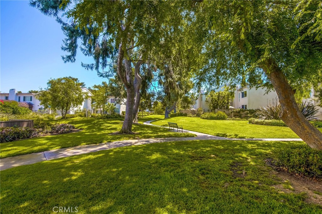 20 Acacia Tree Lane Irvine, CA 92612 - Photo 30 of 44 a view of swimming pool with yard and green space