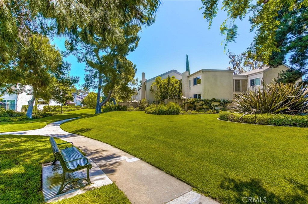 20 Acacia Tree Lane Irvine, CA 92612 - Photo 31 of 44 a view of a house with garden