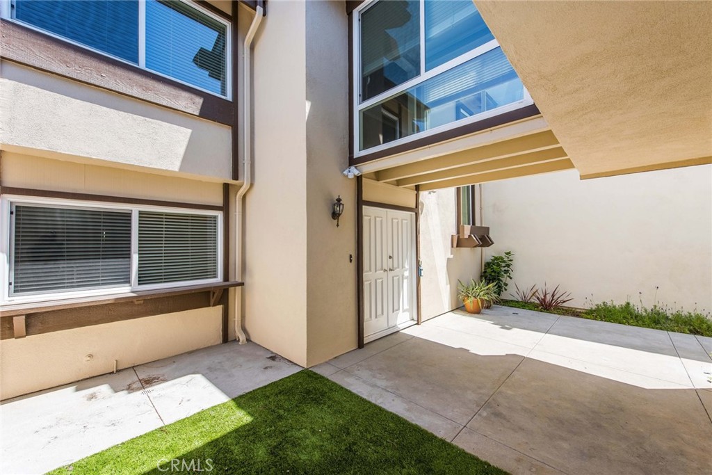 20 Acacia Tree Lane Irvine, CA 92612 - Photo 39 of 44 a front view of a house with a yard