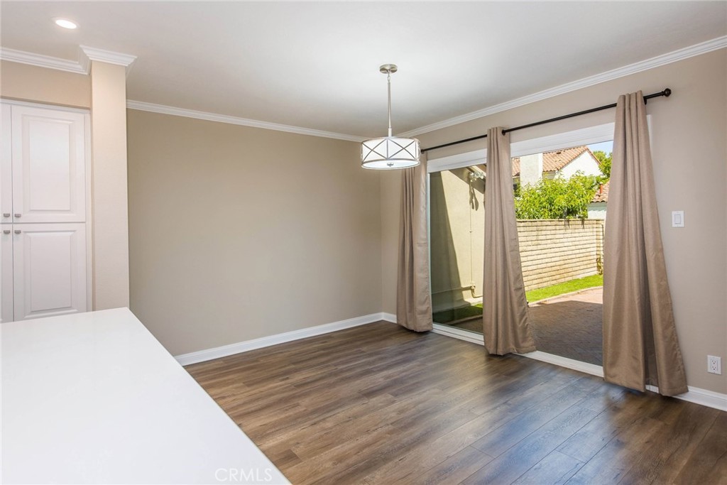 20 Acacia Tree Lane Irvine, CA 92612 - Photo 10 of 44 wooden floor in an empty room with a window