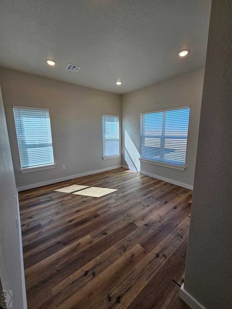 28651 County Road 24.6 Springfield, CO 81073 - Photo 12 of 18 a view of empty room with wooden floor and fan