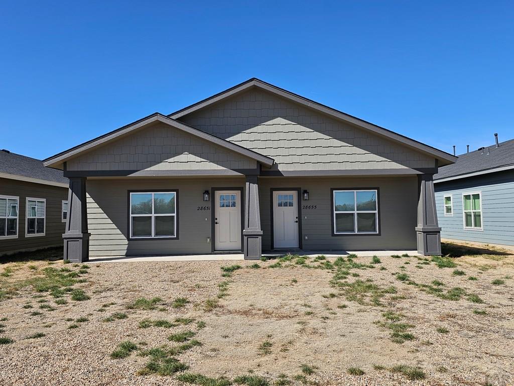 28651 County Road 24.6 Springfield, CO 81073 - Photo 15 of 18 a front view of a house with a yard