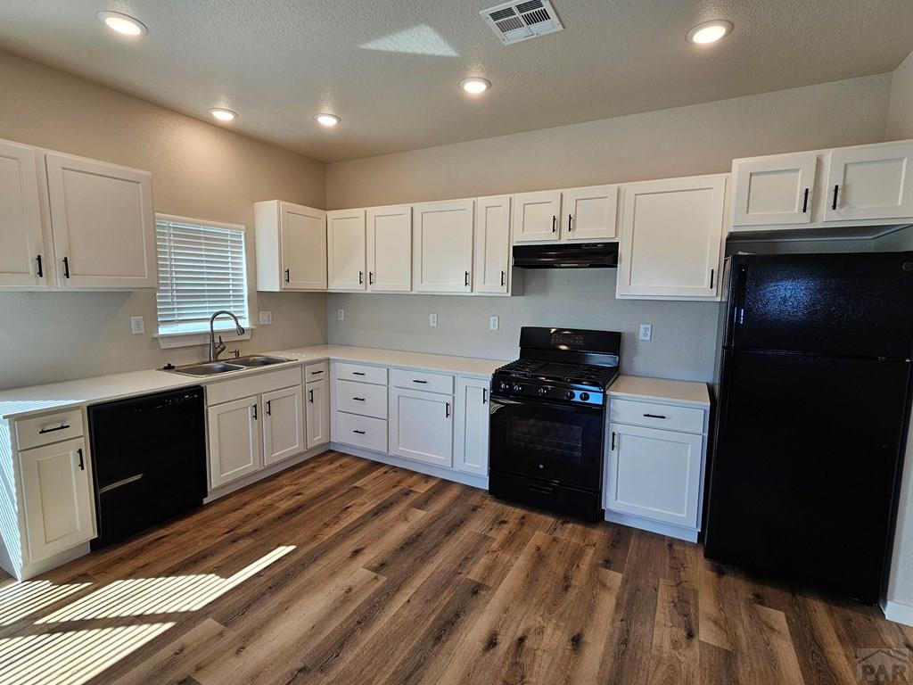 28651 County Road 24.6 Springfield, CO 81073 - Photo 5 of 18 a kitchen with a sink a stove and refrigerator