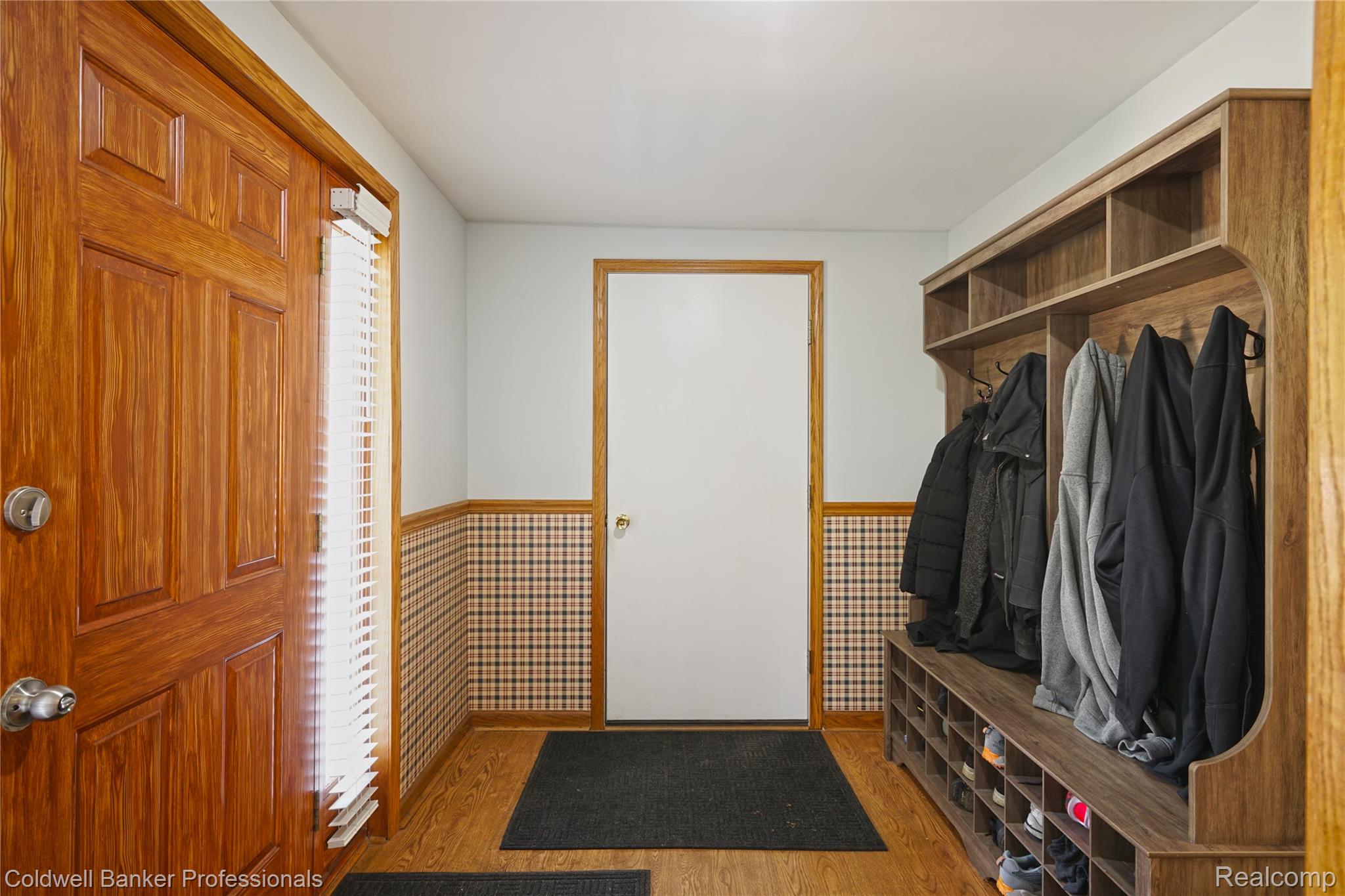 7194 North Center Road Mount Morris, MI 48458 - Photo 21 of 31 with access from front door or garage a great space to come home to or greet guest. Room for shoes/coats or wipes off dogs and kids :)