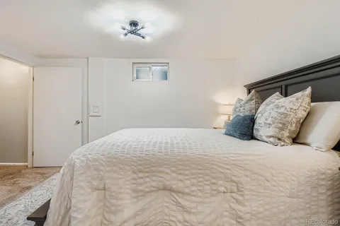 a large white bed in a white room