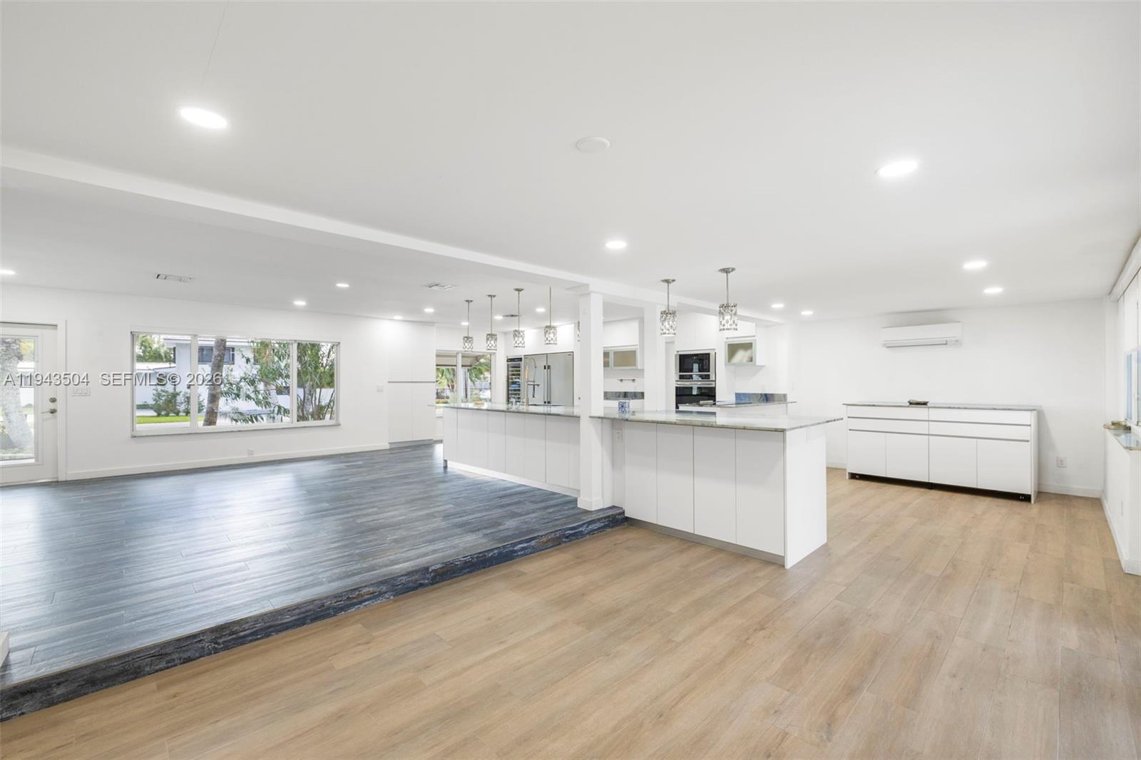1895 Ixora Road North Miami, FL 33181 - Photo 15 of 42 a view of kitchen with kitchen island and stainless steel appliances