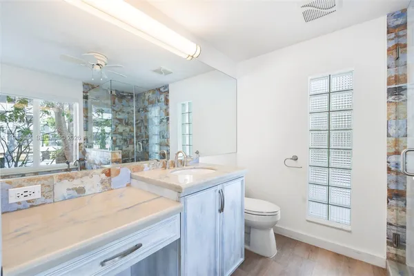 a view of bathroom with dual sinks