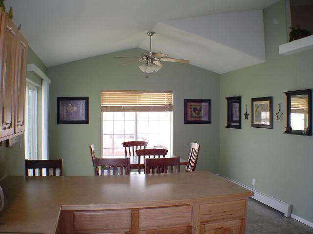 324 Evergreen Drive Rifle, CO 81650 - Photo 3 of 9 a view of a dining room with furniture