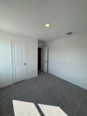 a living room with a toilet