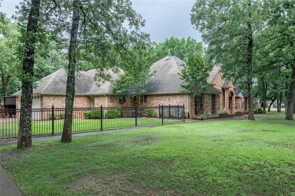 320 Rustic Oaks Road Combine, TX 75159 - Photo 4 of 40 View of yard featuring a garage