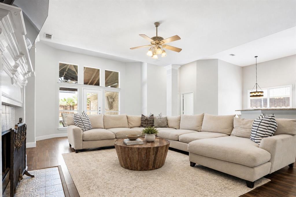 7907 Rasor Drive Frisco, TX 75036 - Photo 13 of 40 Spacious living area with gas fireplace