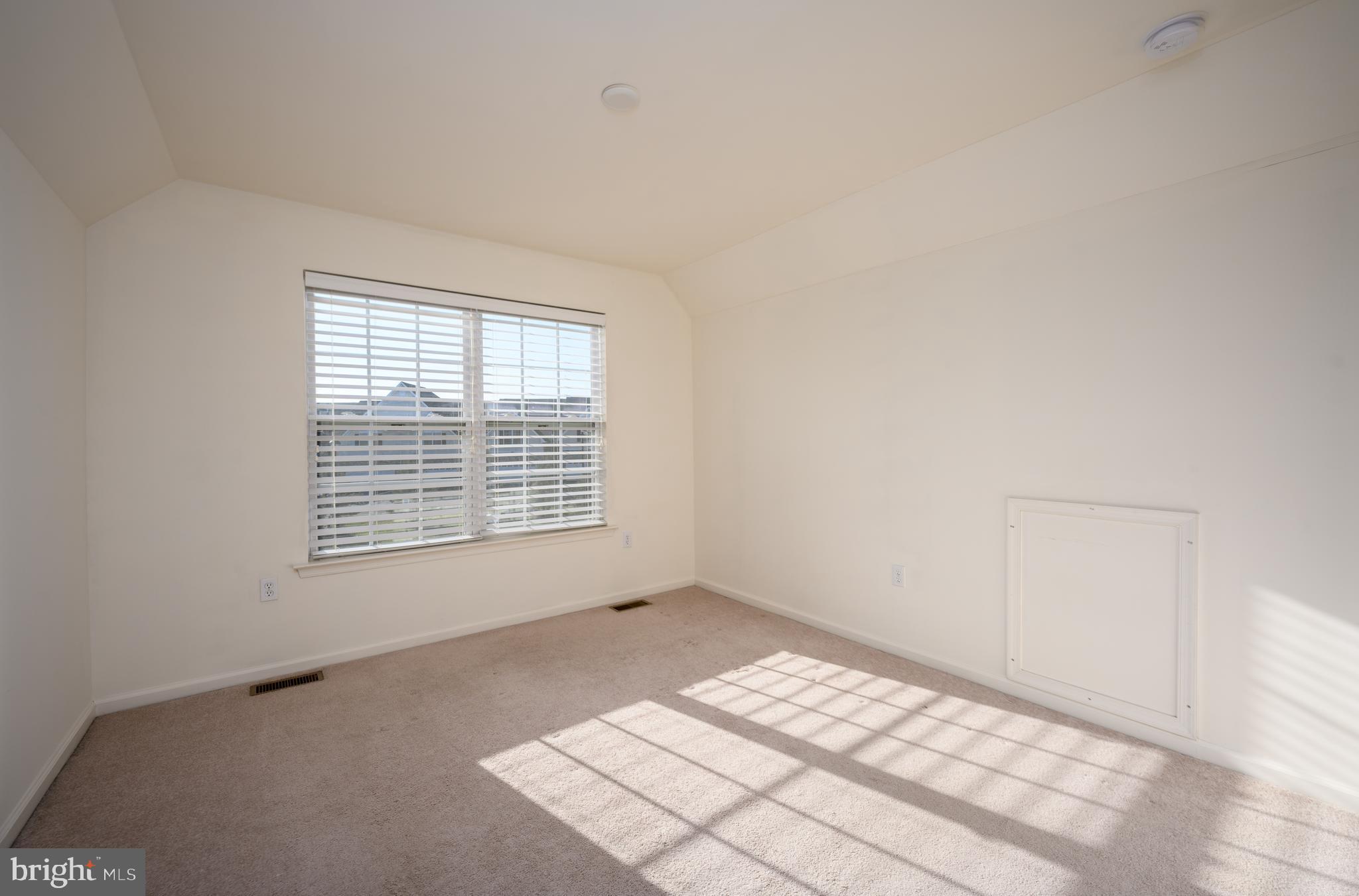 249 Concord Place Pennington, NJ 08534 - Photo 19 of 22 a view of an empty room with a window
