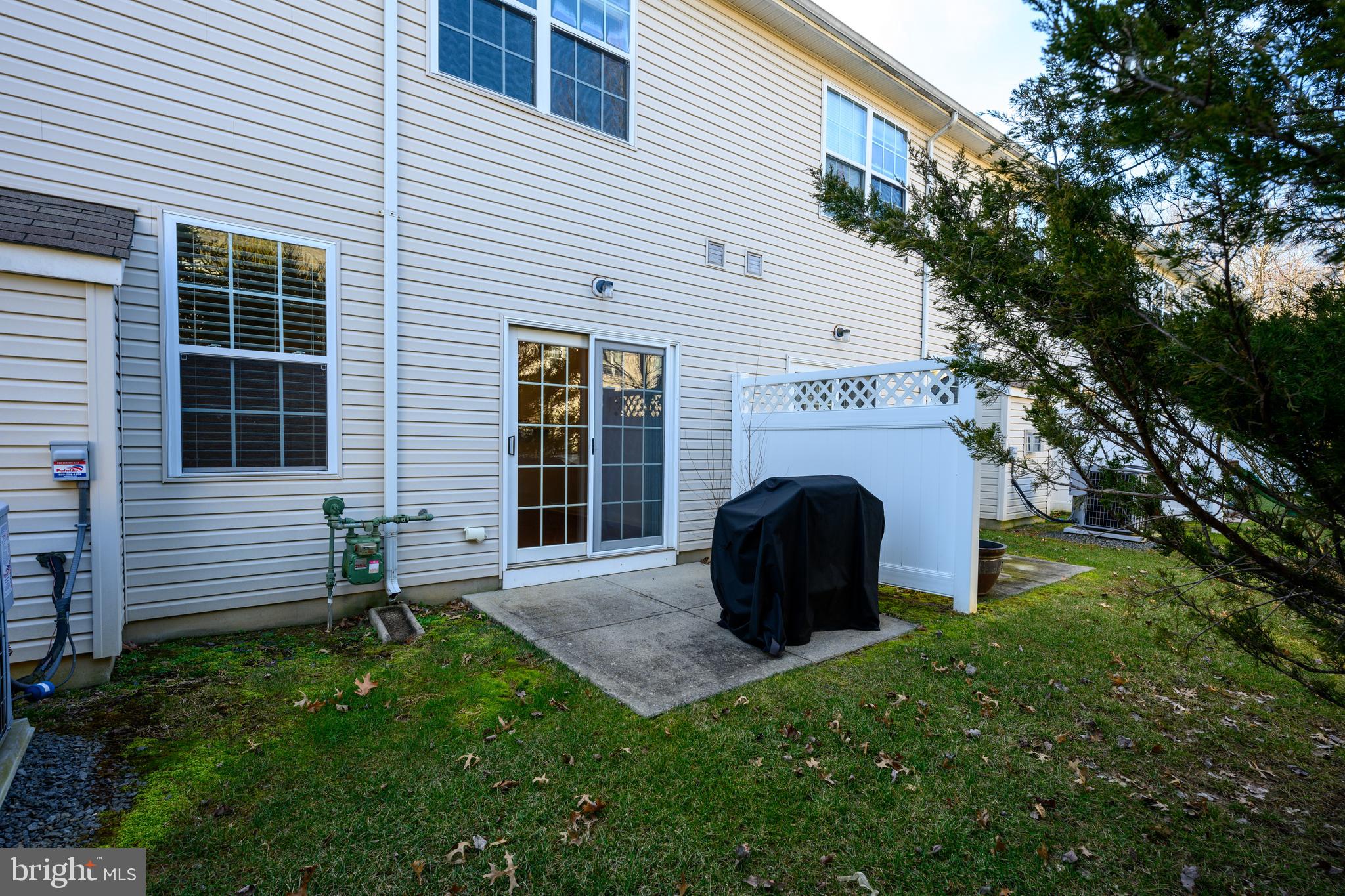 249 Concord Place Pennington, NJ 08534 - Photo 21 of 22 a view of backyard with a garden and entertaining space