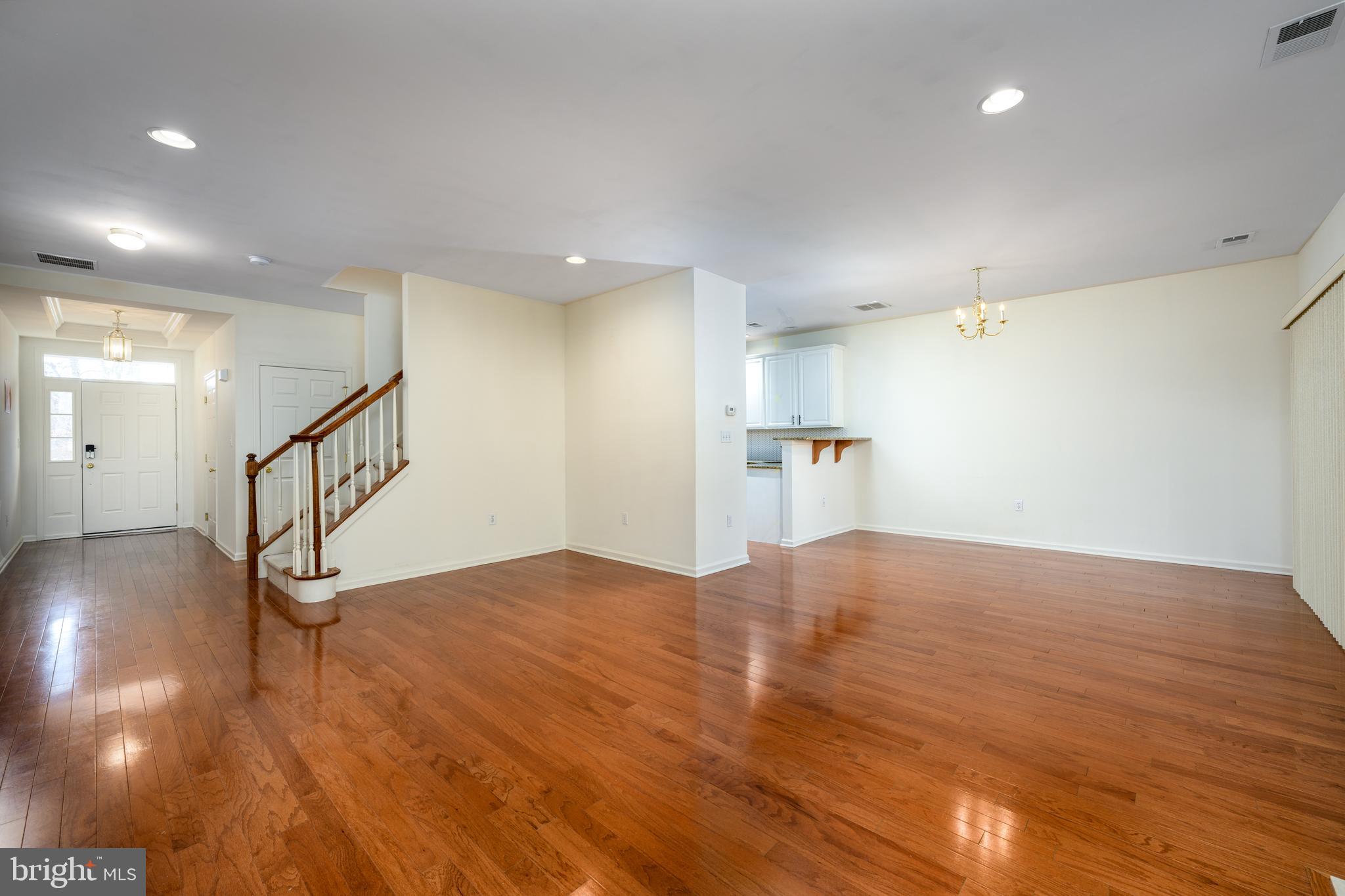 249 Concord Place Pennington, NJ 08534 - Photo 4 of 22 a view of empty room with wooden floor