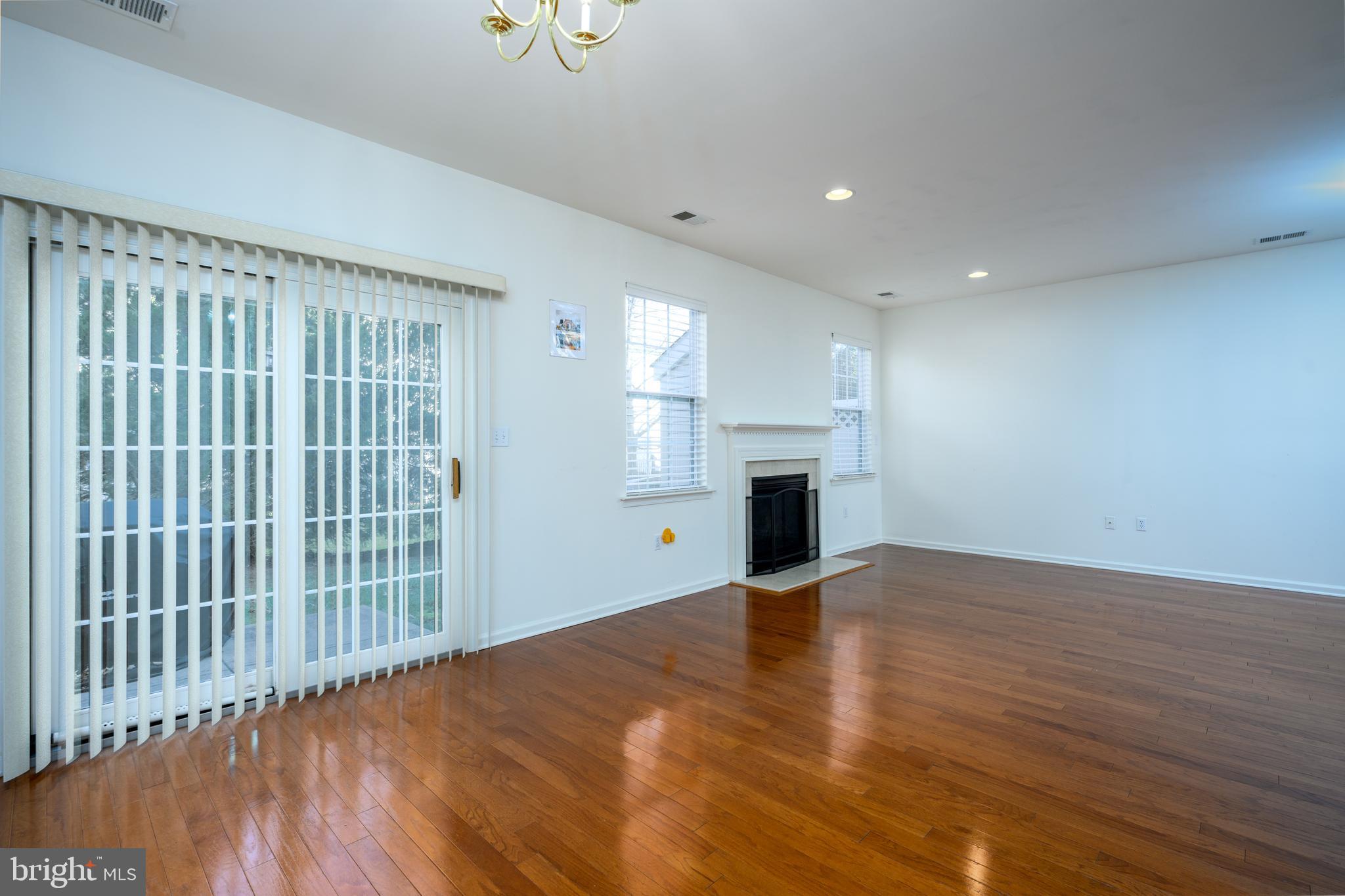 249 Concord Place Pennington, NJ 08534 - Photo 6 of 22 a view of an empty room with a window