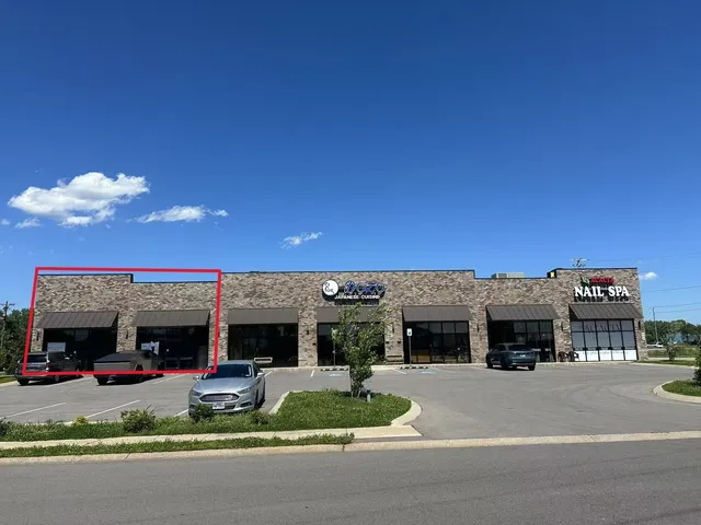 a view of a big yard with a fireplace
