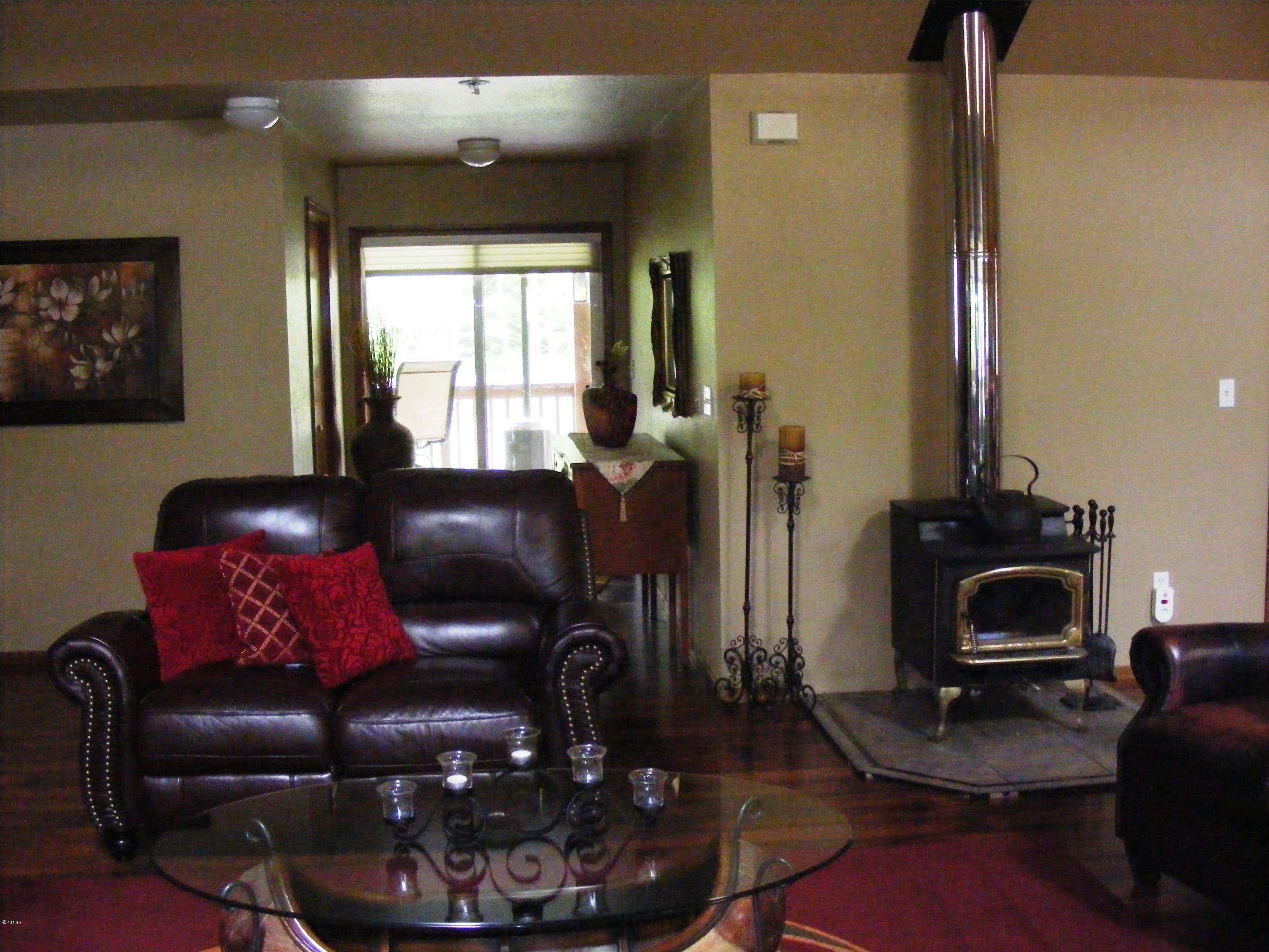 463 Judd Road Siletz, OR 97380 - Photo 4 of 22 Liv Rm & Wood Stove