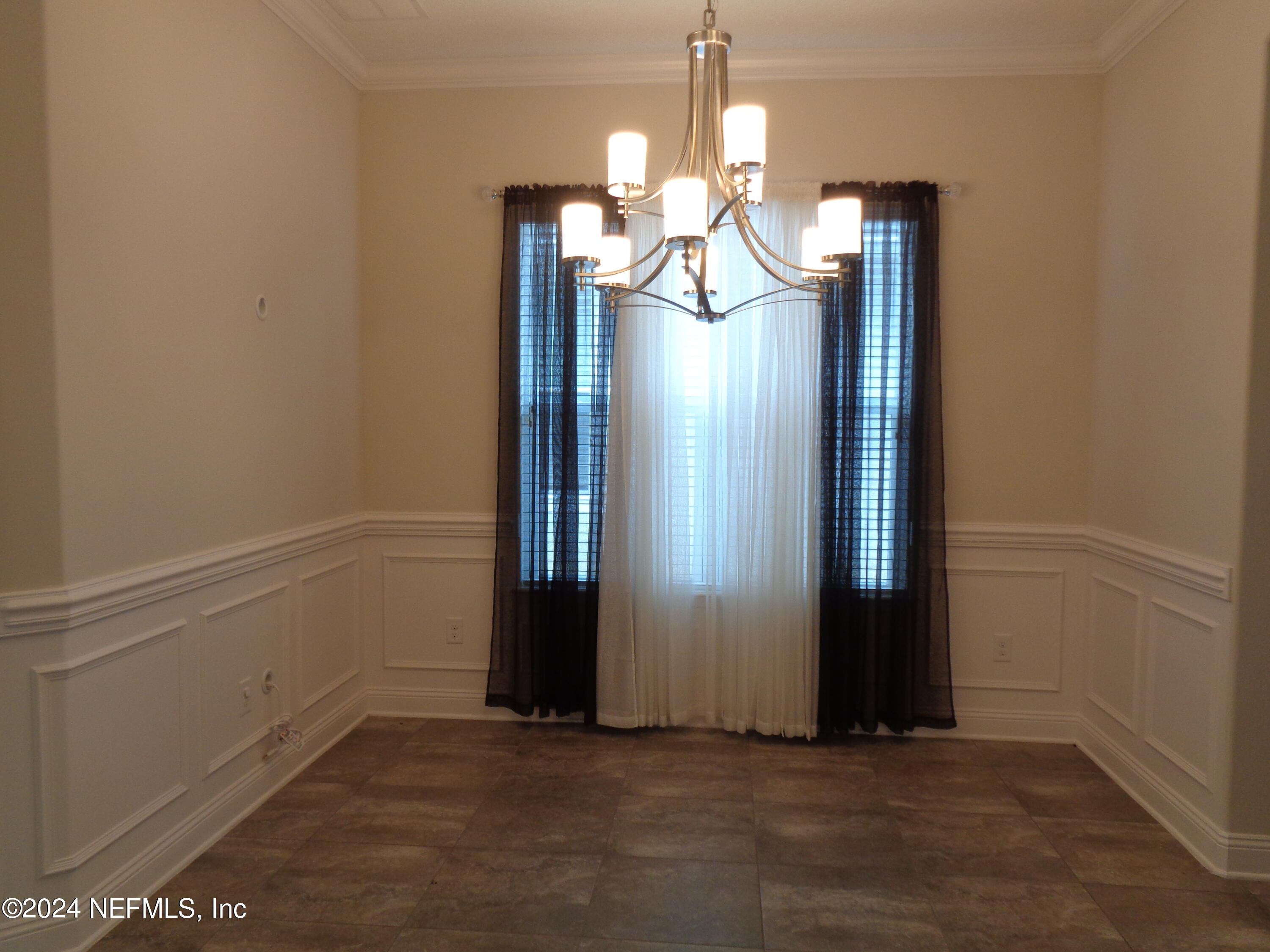 4055 Arbor Mill Circle Orange Park, FL 32065 - Photo 21 of 44 an empty room with a mirror