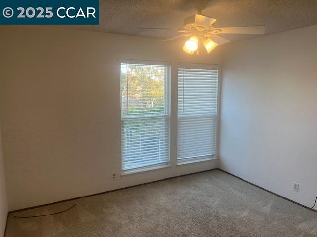 1851 Harrison Street, Unit 15 Concord, CA 94520 - Photo 11 of 41 a view of empty room with window