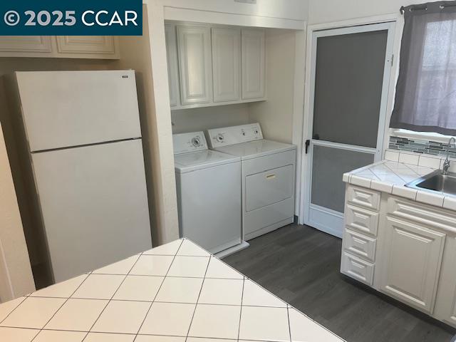 1851 Harrison Street, Unit 15 Concord, CA 94520 - Photo 18 of 41 a utility room with dryer and washer
