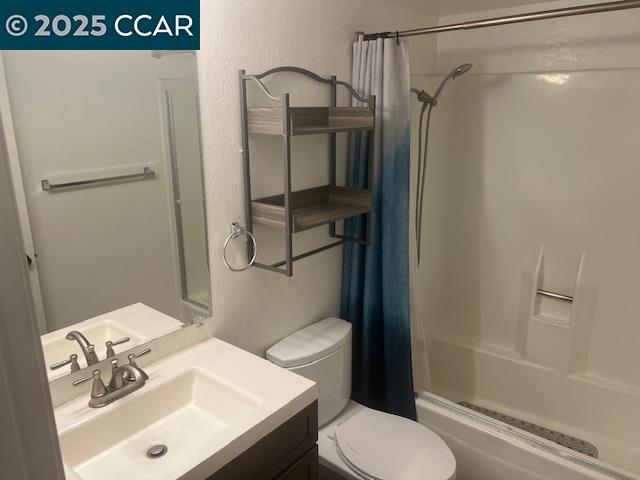1851 Harrison Street, Unit 15 Concord, CA 94520 - Photo 30 of 41 a bathroom with a sink a toilet and shower