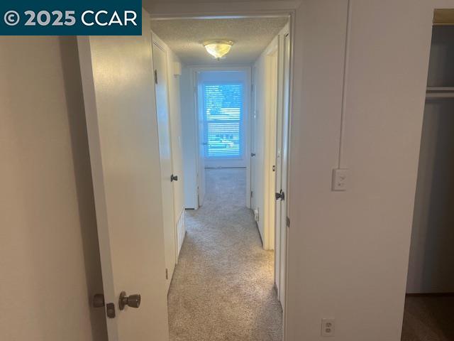 1851 Harrison Street, Unit 15 Concord, CA 94520 - Photo 36 of 41 a view of a hallway