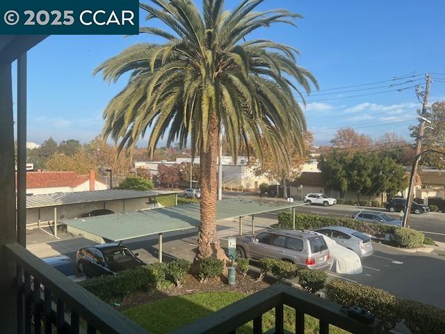 1851 Harrison Street, Unit 15 Concord, CA 94520 - Photo 38 of 41 a view of a lake with a palm tree