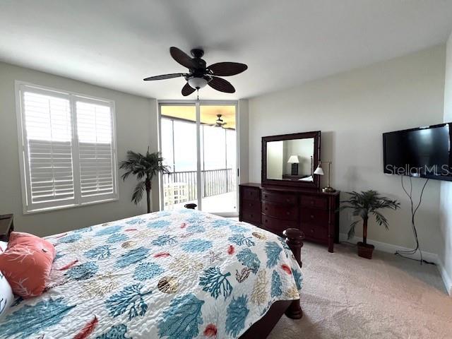 3321 Sunset Key Circle, Unit 502 Punta Gorda, FL 33955 - Photo 16 of 53 a bedroom with a bed and a flat screen tv