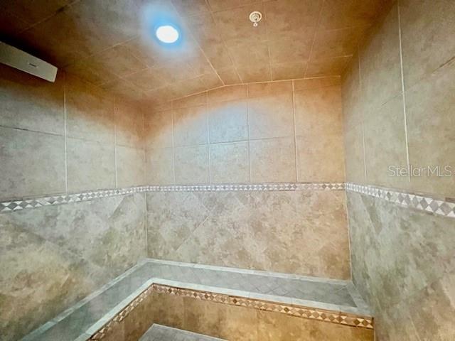 3321 Sunset Key Circle, Unit 502 Punta Gorda, FL 33955 - Photo 27 of 53 a bathroom with a shower and a window