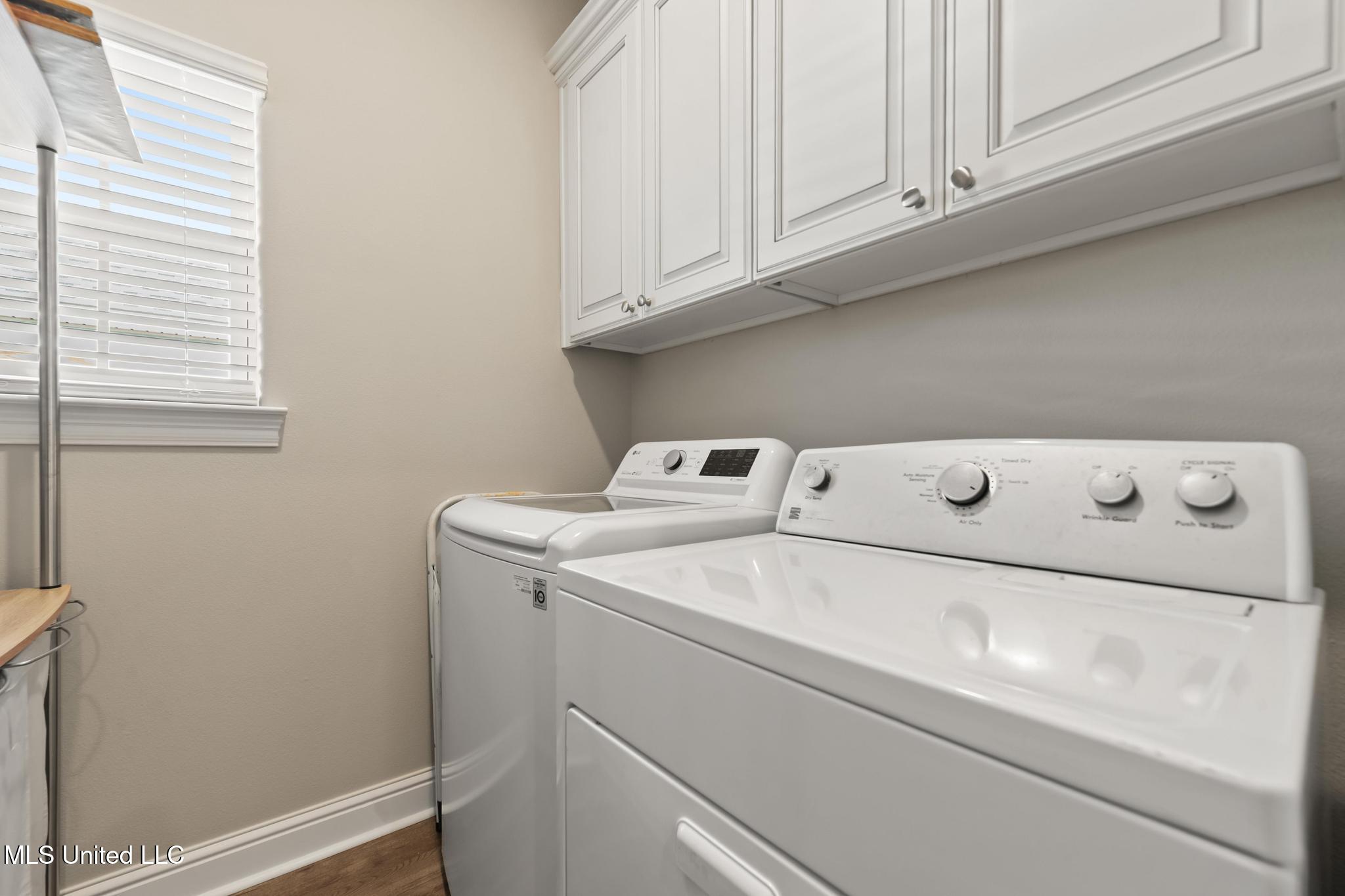 114 Everly Circle Ocean Springs, MS 39564 - Photo 18 of 24 Spacious Laundry with storage