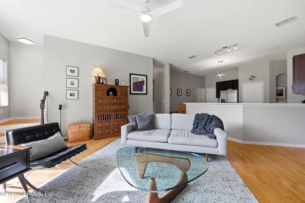 a living room with furniture and a couch
