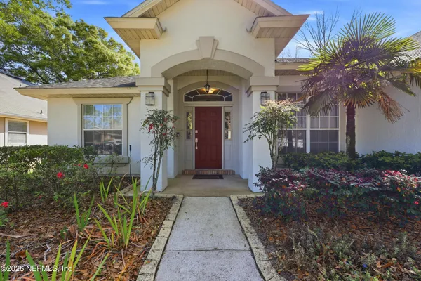 a front view of a house with a porch
