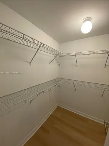 a view of a room with racks on the wall