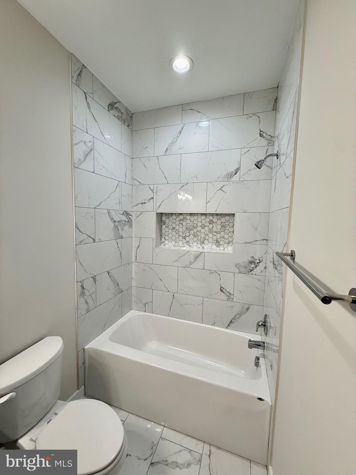 228 Dale Drive Colonial Beach, VA 22443 - Photo 26 of 59 a bathroom with a toilet and bathtub